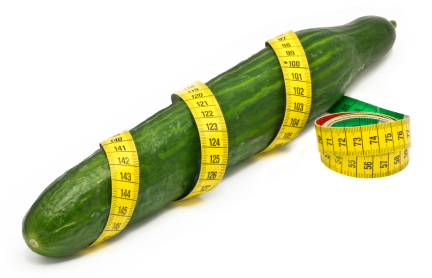 Cucumber wrapped in a measuring tape to symbolize penis size